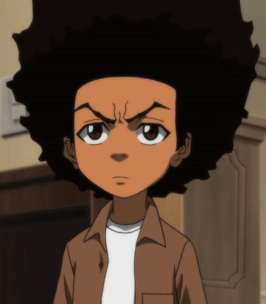 Huey Freeman Boondocks wallpaper with large afro stoic expression in classic brown shirt