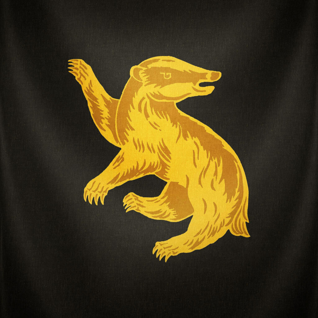 Hufflepuff wallpaper with golden badger emblem on dark background Hogwarts house pride