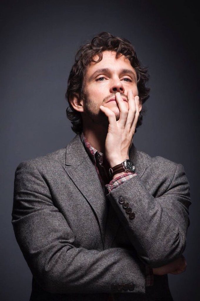 Hugh Dancy in grey tweed blazer and plaid shirt thoughtful studio portrait with soft lighting Wallpaper