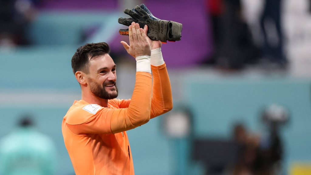 Hugo Lloris smiling and clapping in orange kit FIFA World Cup sportsmanship wallpaper background