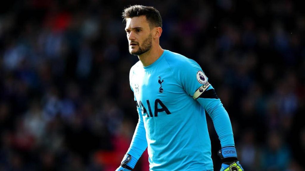 Hugo Lloris focused in light blue Tottenham Hotspur goalkeeper kit with captain armband wallpaper