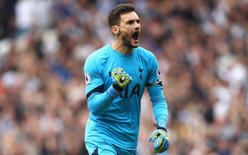 Hugo Lloris Tottenham Hotspur goalkeeper in blue kit yelling in stadium celebrating victory wallpaper