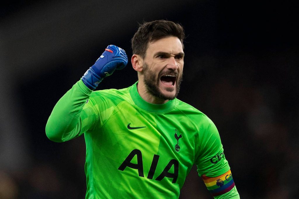 Hugo Lloris Tottenham goalkeeper in neon green kit celebrating with fist pump wallpaper