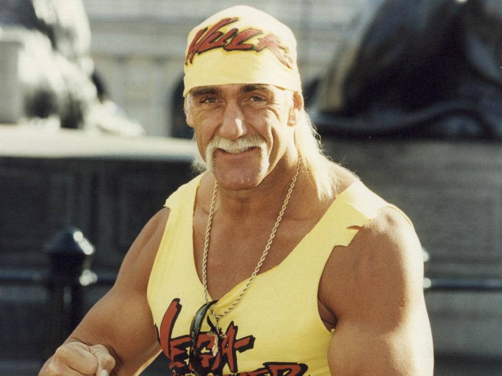 Hulk Hogan intense portrait with yellow bandana white mustache WWE wrestling wallpaper background