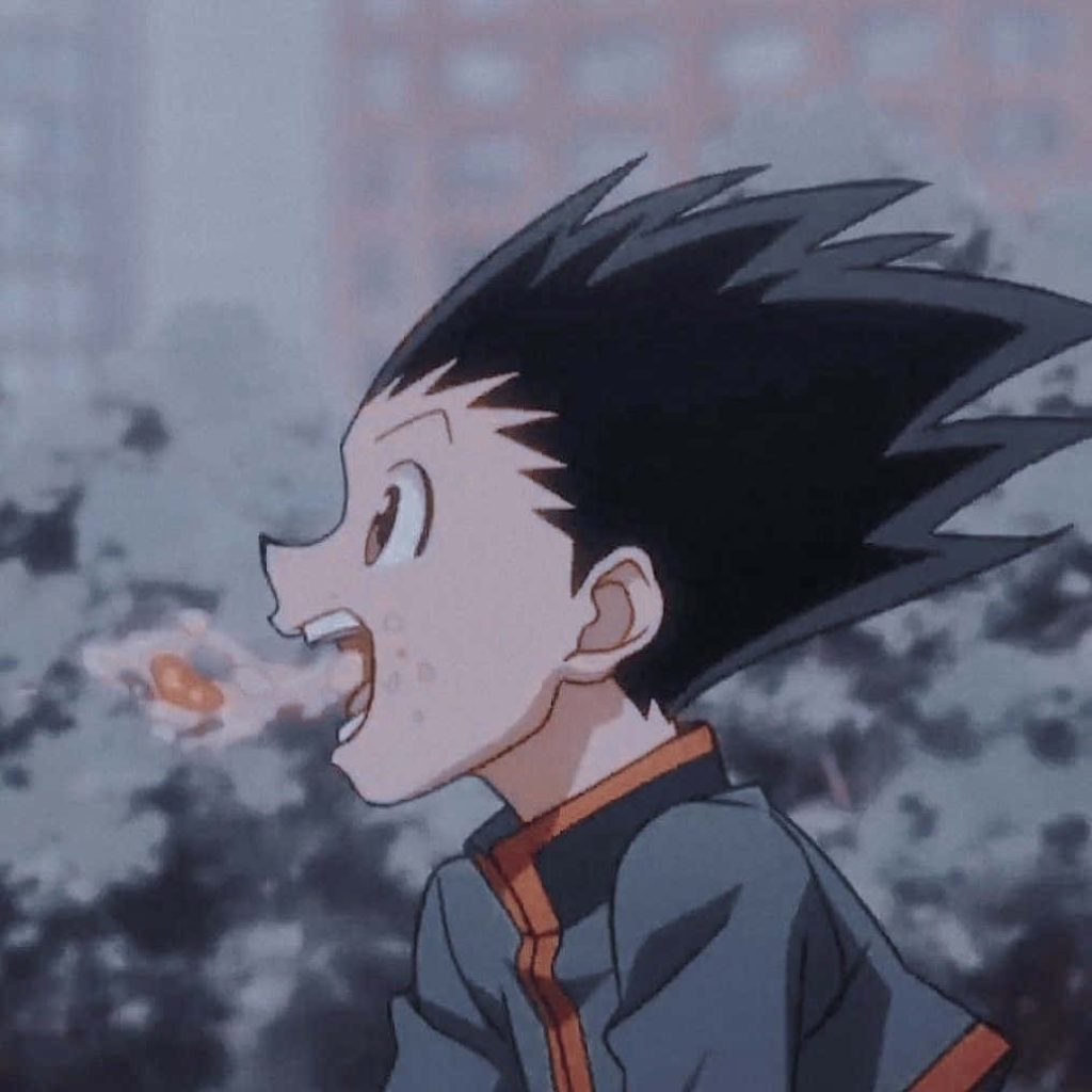 Hunter x Hunter wallpaper of Gon Freecss eating with spiky hair in a soft muted anime style