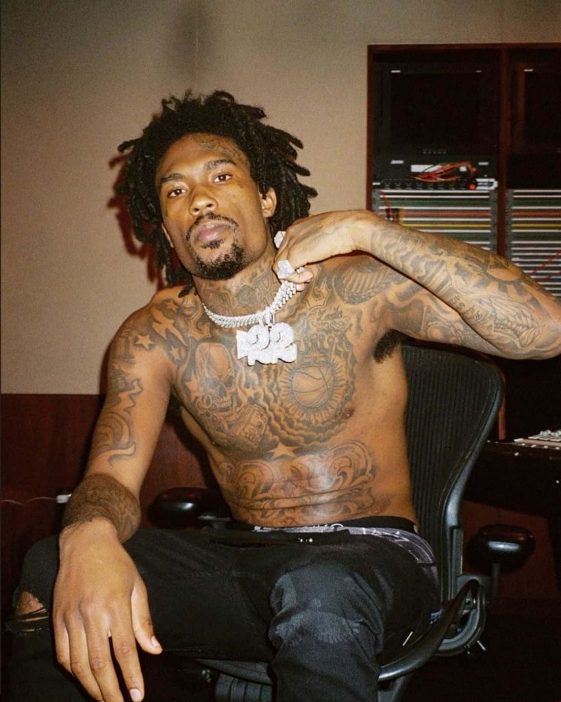 Rapper Hunxho studio wallpaper with dreadlocks tattoos and diamond 122 pendant background