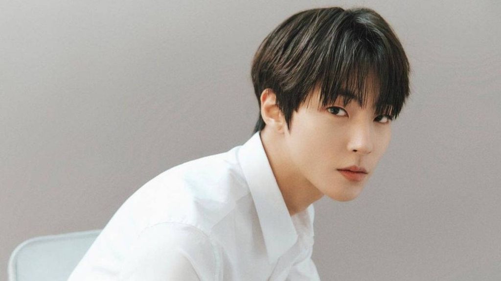 South Korean actor Hwang In-youp in white shirt studio portrait minimalist wallpaper background