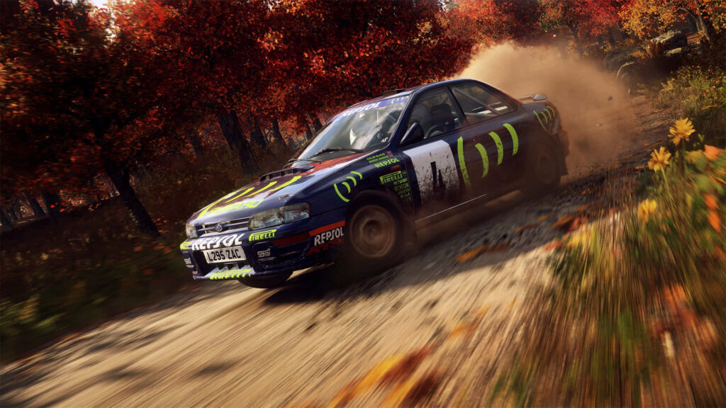 Hyundai rally car drifting on dusty trail in vibrant autumn forest dirt rally racing action wallpaper