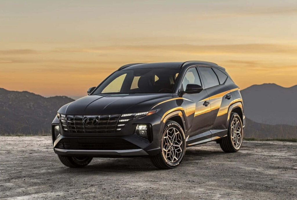 Hyundai SUV Wallpaper: Modern Design Against Stunning Sunset Background