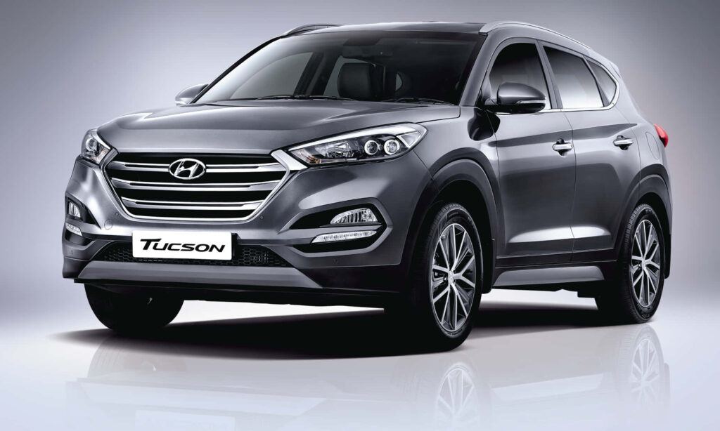 Stylish Hyundai Tucson Wallpaper: Modern SUV Design for Adventure