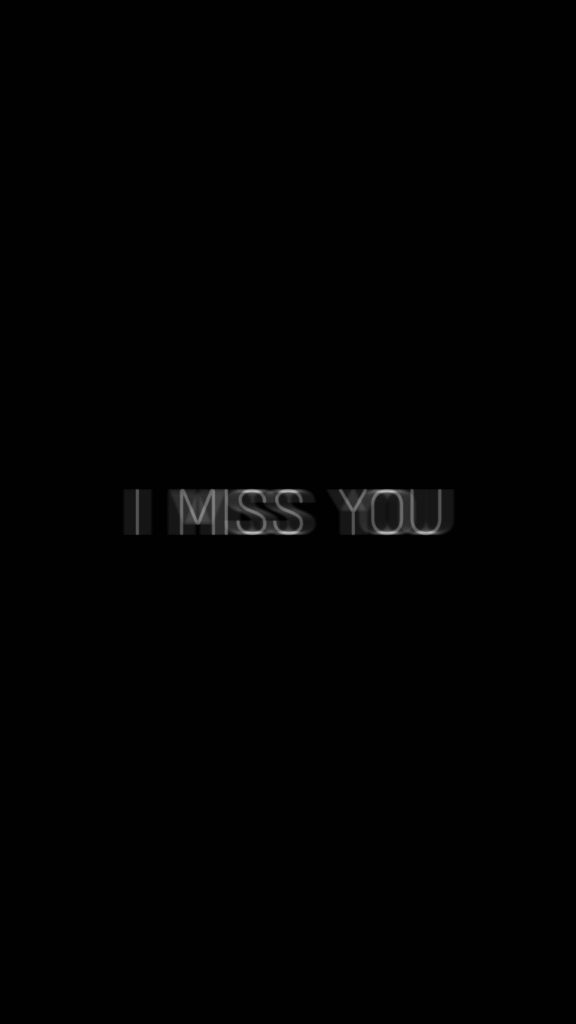 Dark minimalist I MISS YOU wallpaper with white glitch text on black high-contrast background