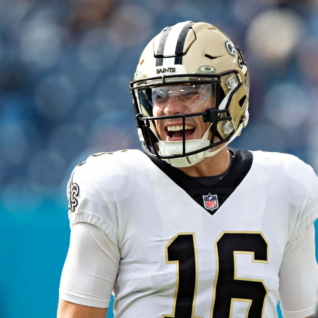 Ian Book New Orleans Saints quarterback smiling in action #16 jersey NFL wallpaper background