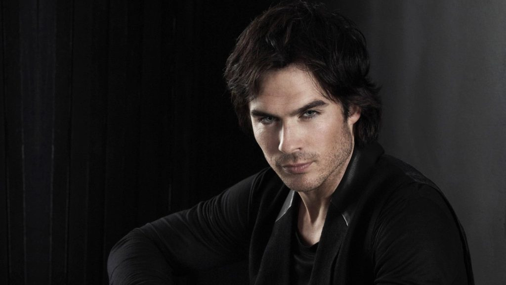 Ian Somerhalder intense gaze black shirt moody portrait dark minimalist studio wallpaper background