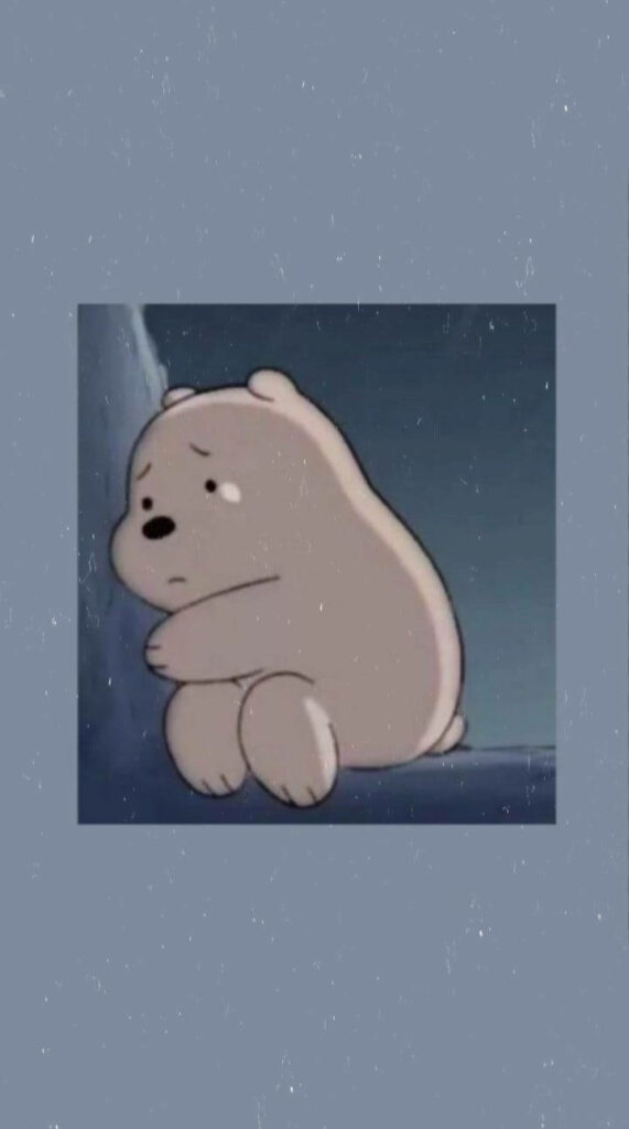 Calmly Distressed: Ice Bear on a Tree Branch in a Serene Blue Aesthetic Setting Wallpaper