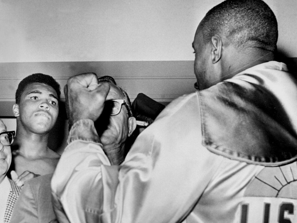 Ali vs. Liston Weigh-In Wallpaper: Iconic Boxing Rivalry Background