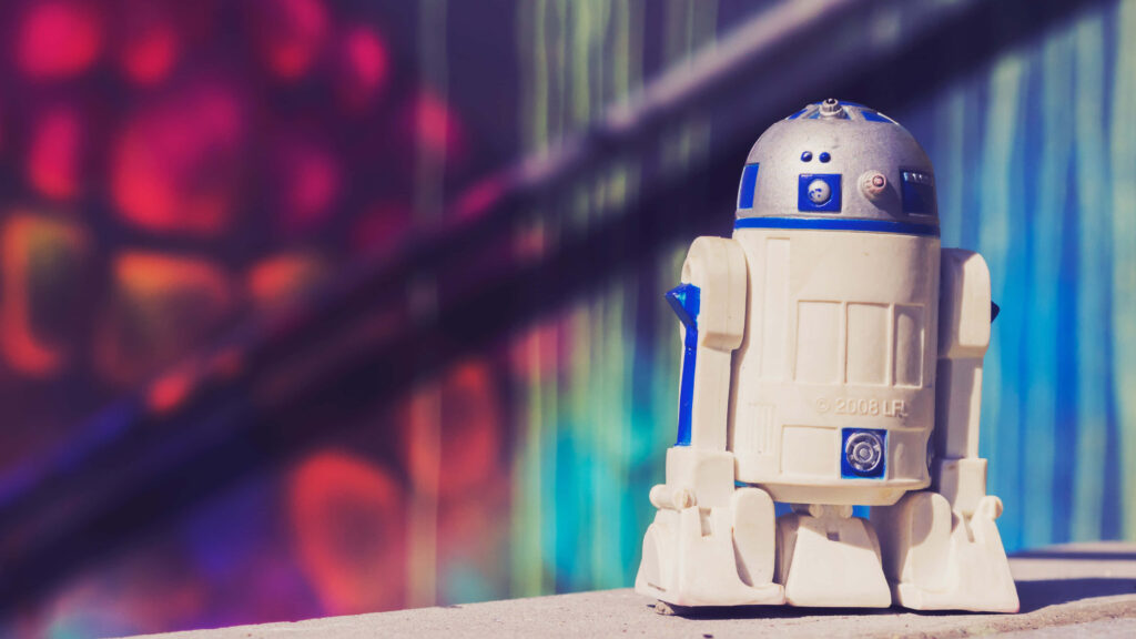 R2-D2: The Beloved Key Player in Star Wars Saga Wallpaper
