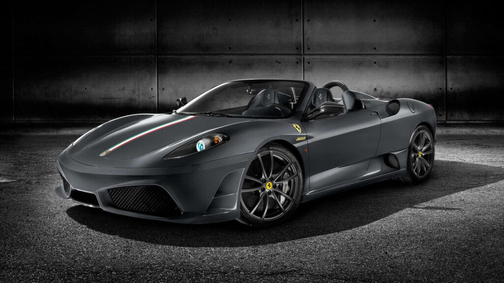 Iconic Elegance: A Radiant Nighttime Showcase of the Beloved Italian Classic - 1920x1080 Ferrari Background Wallpaper