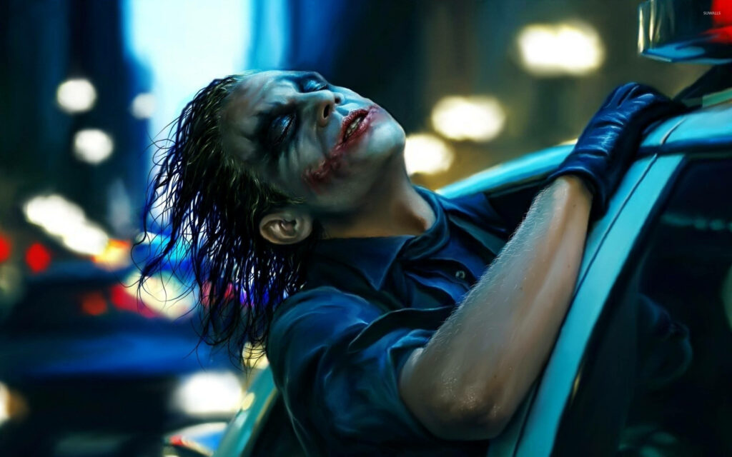 Intense Joker Wallpaper from The Dark Knight – Chaotic Cityscape