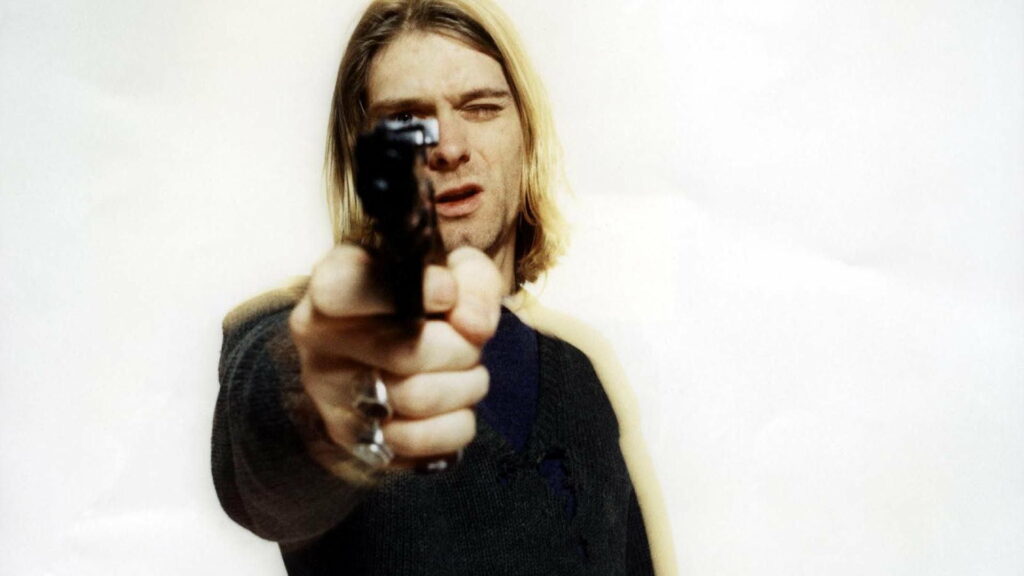 Reflective Nirvana: High Definition Wallpaper featuring Kurt Cobain's Captivating Background Image