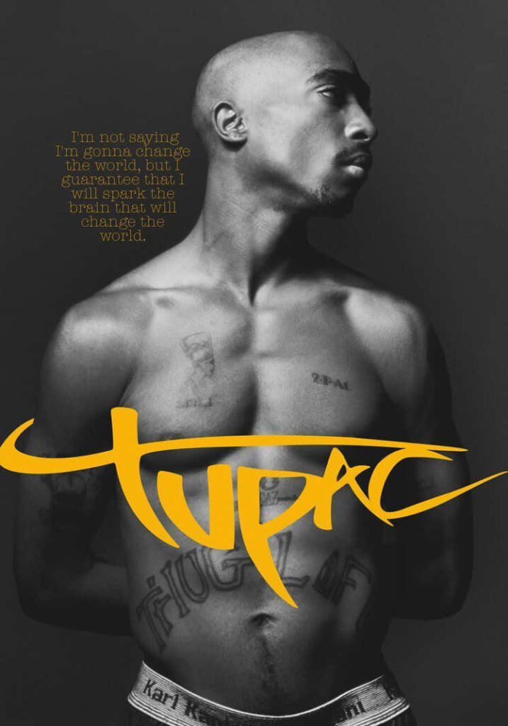 Youthful Confidence: Tupac Shakur Exudes Strength in Striking Monochrome Portrait Wallpaper