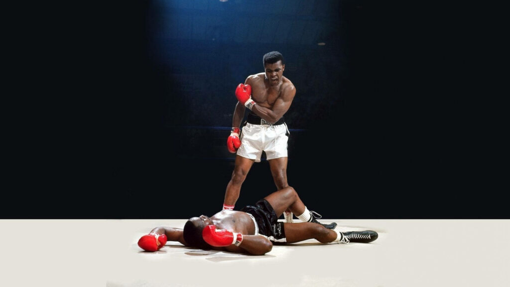Iconic Muhammad Ali Victory Wallpaper – Legendary Boxing History