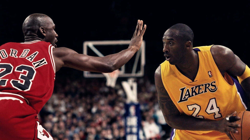 Unifying Legends: Iconic Encounter between NBA Superstars Michael Jordan and Kobe Bryant Wallpaper
