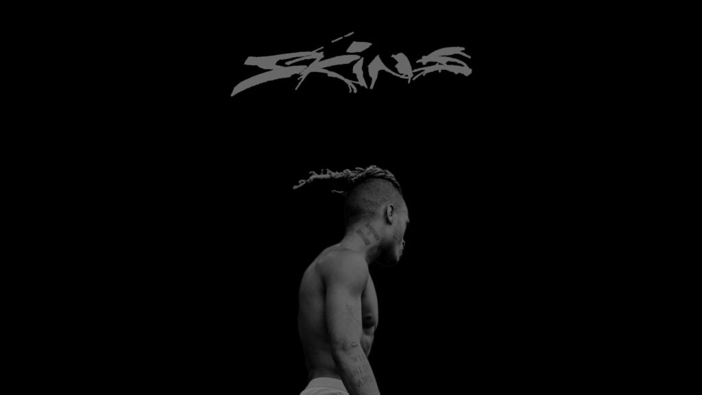 Skins: Xxxtentacion's Powerful Aura Illuminating the Digital Realm Wallpaper