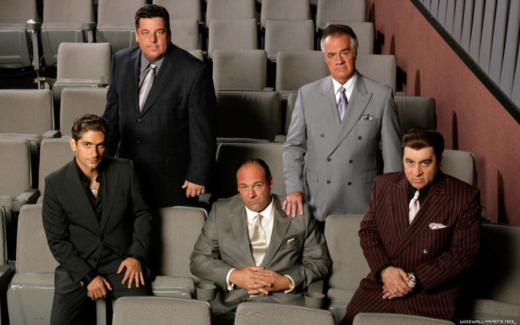 Iconic Sopranos Wallpaper: Dapper Characters in a Formal Setting