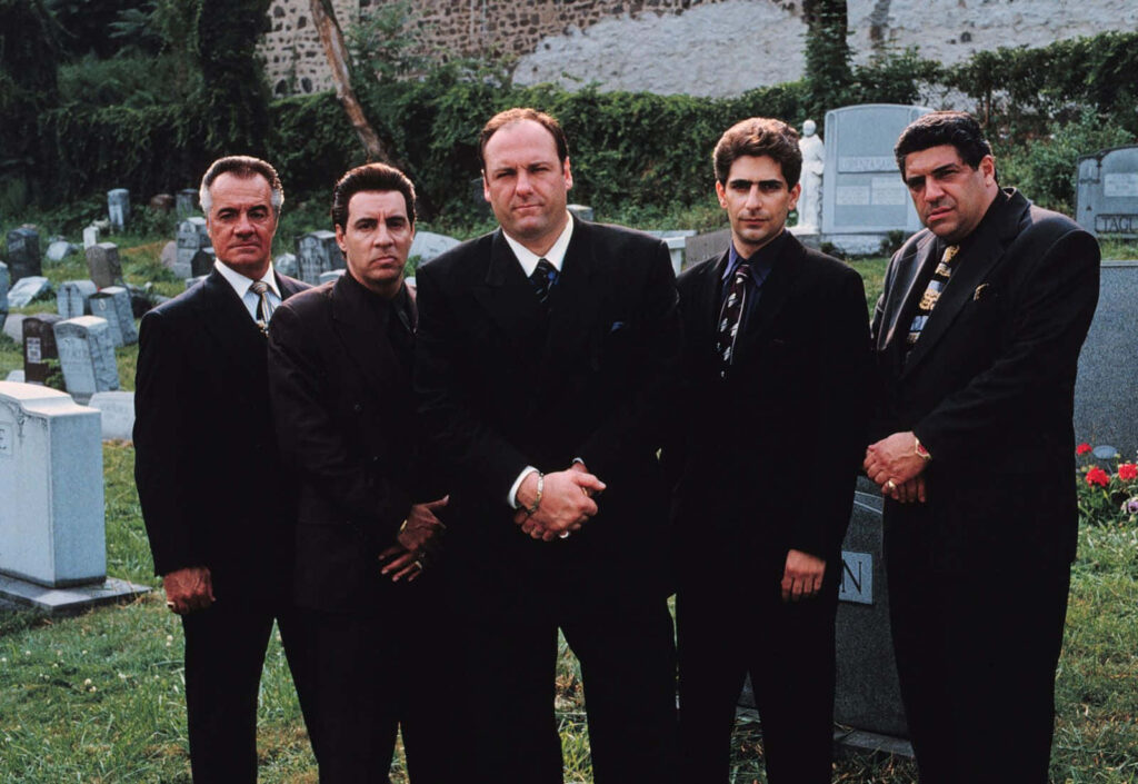 Captivating 'The Sopranos' Wallpaper: Tony & Crew Against an Iconic Backdrop
