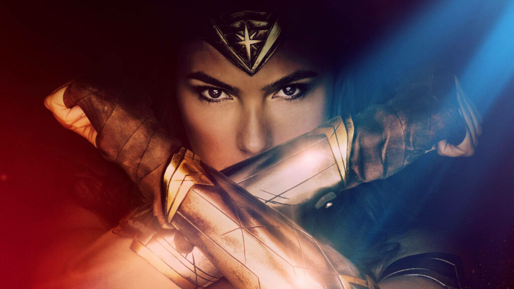 Battle-Ready Wonder Woman against a Vibrant Iconic Backdrop Wallpaper