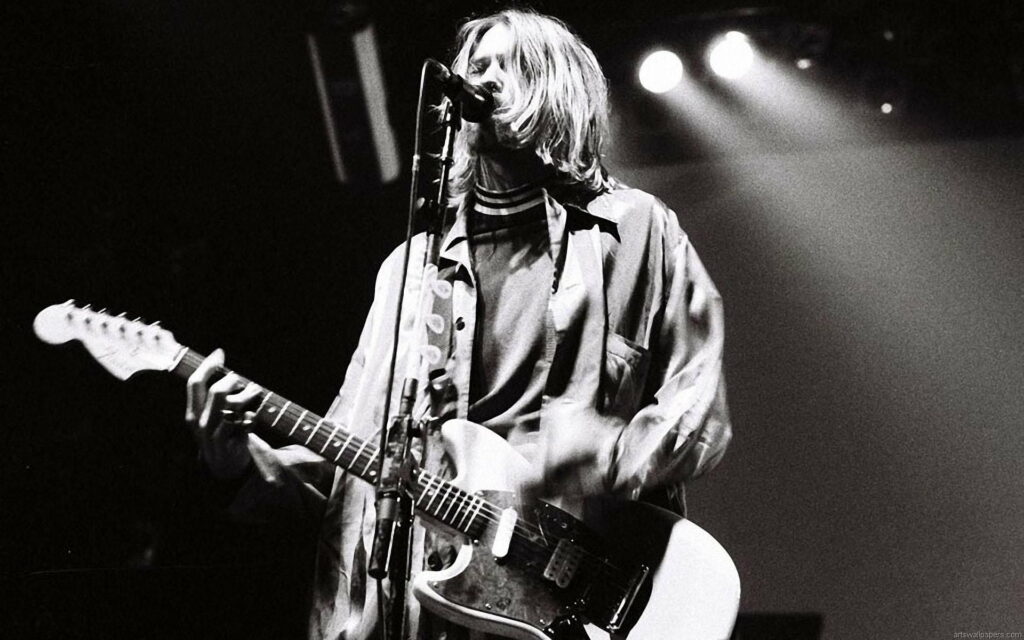 Nirvana's Words Echo through HD Wallpaper: Kurt Cobain's Inspiring Quotes Enveloped in a Mesmerizing Background