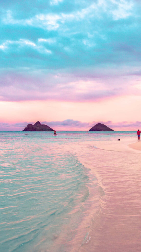 Idyllic Beach Wallpaper: Turquoise Waters & Pastel Sky Bliss