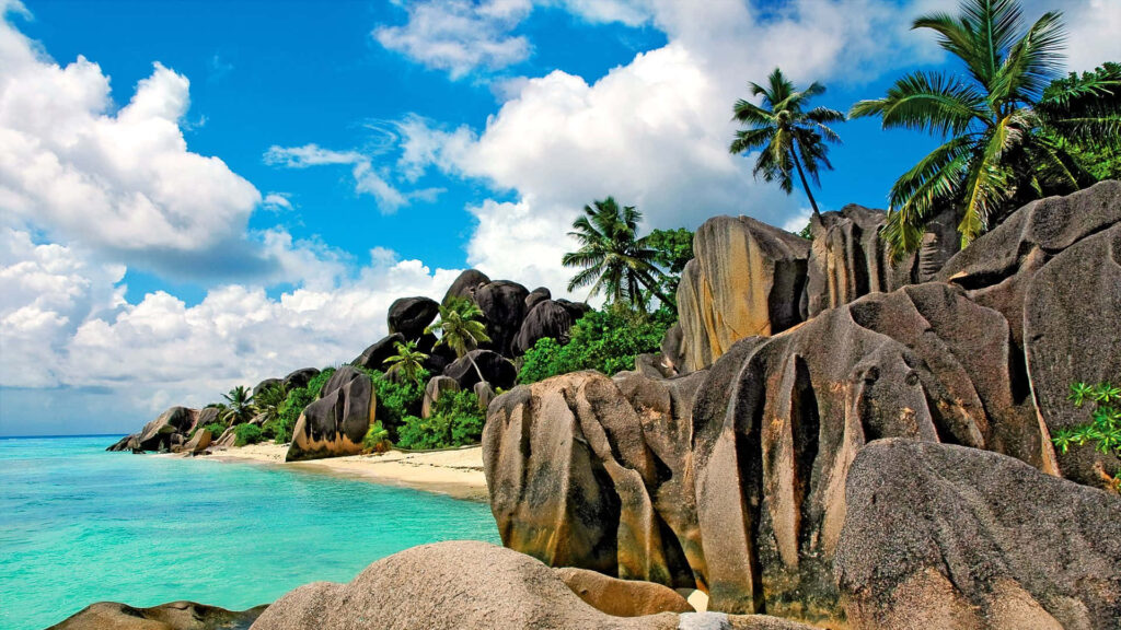 Idyllic Seychelles Beach: Turquoise Waters & Granite Boulders Wallpaper