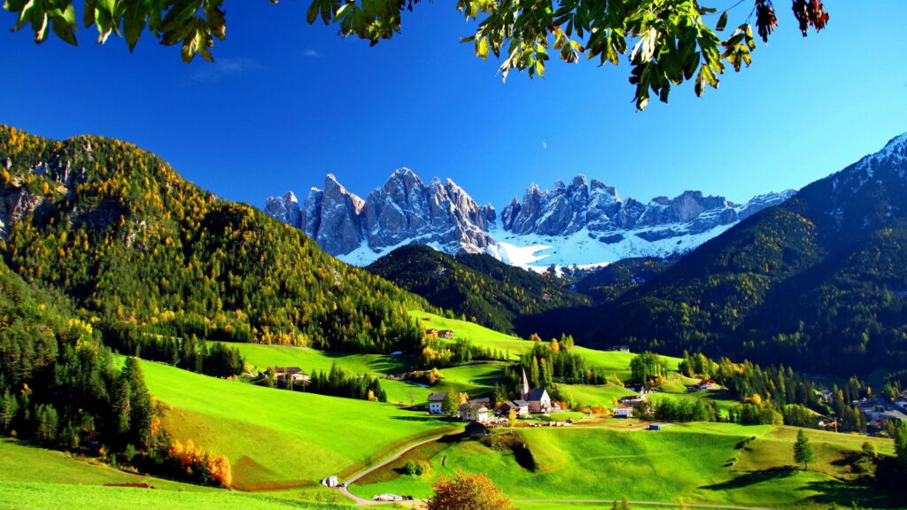 Idyllic Italian Retreat: Serene Mountain Cottage amidst Lush Hills and Colorful Blooms – QHD Wallpaper