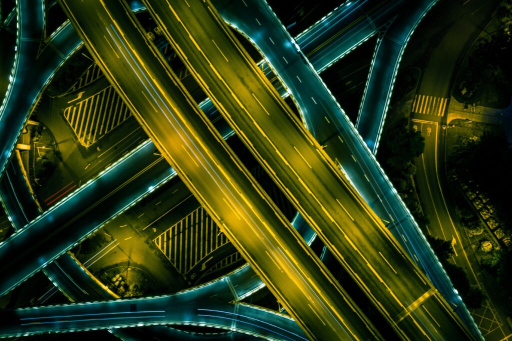 Futuristic Wallpaper: Aerial View of Illuminated Roads & Highways