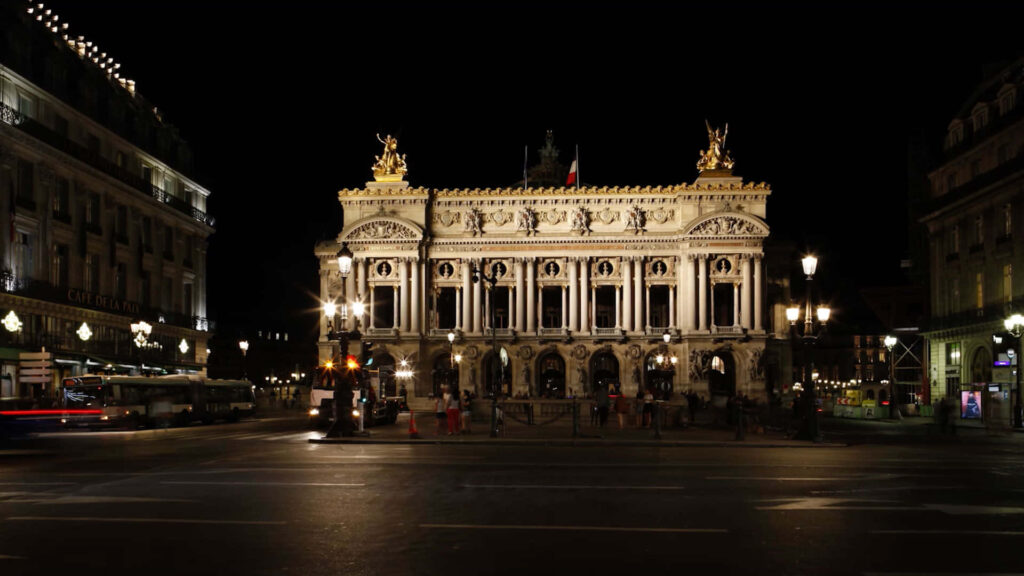 Illuminated Paris Opera House Wallpaper: Nighttime City Charm