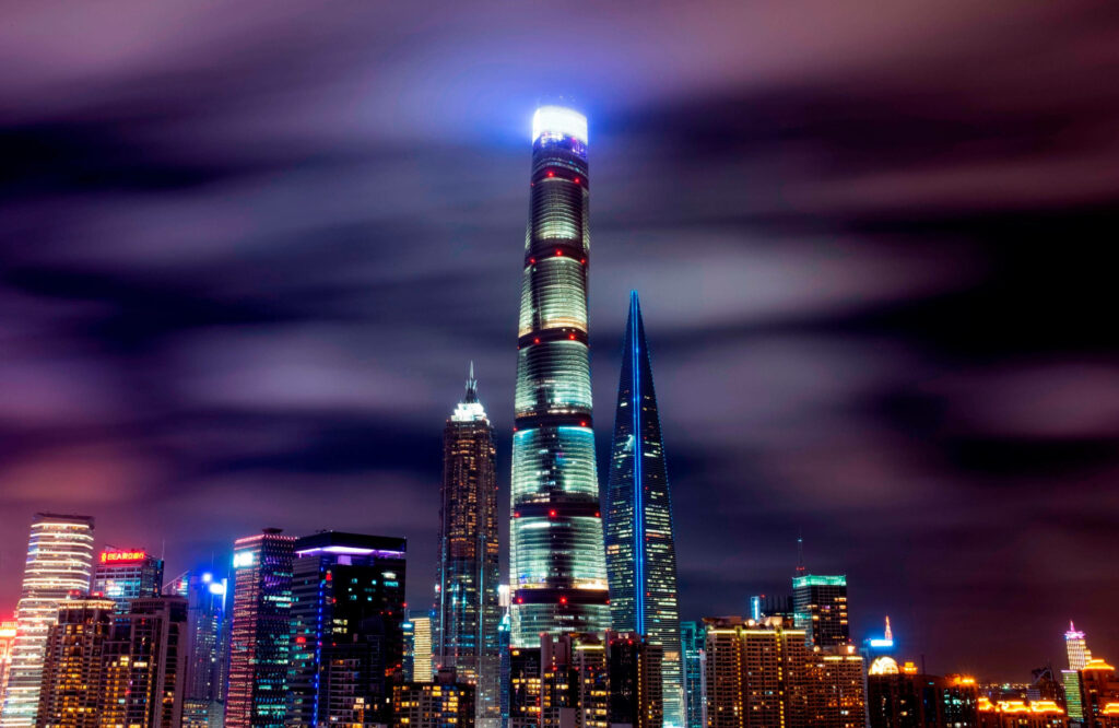 Illuminated Shanghai Tower Wallpaper: Night Sky Skyline Beauty
