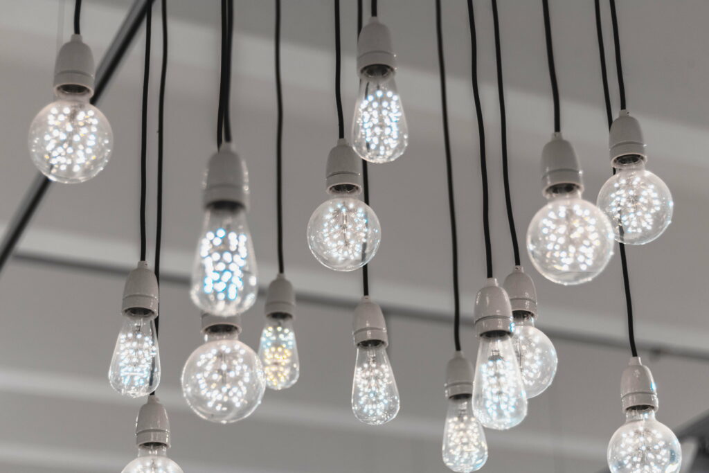 Glowing Innovations: LED Light Bulbs Illuminate a Tangled World of Wires in Stunning 5K Wallpaper