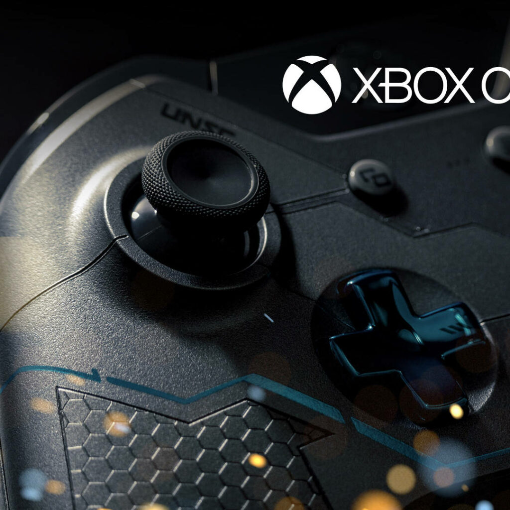 Close-up of a Sleek Black Xbox One Controller on Mysterious Dark Canvas Wallpaper