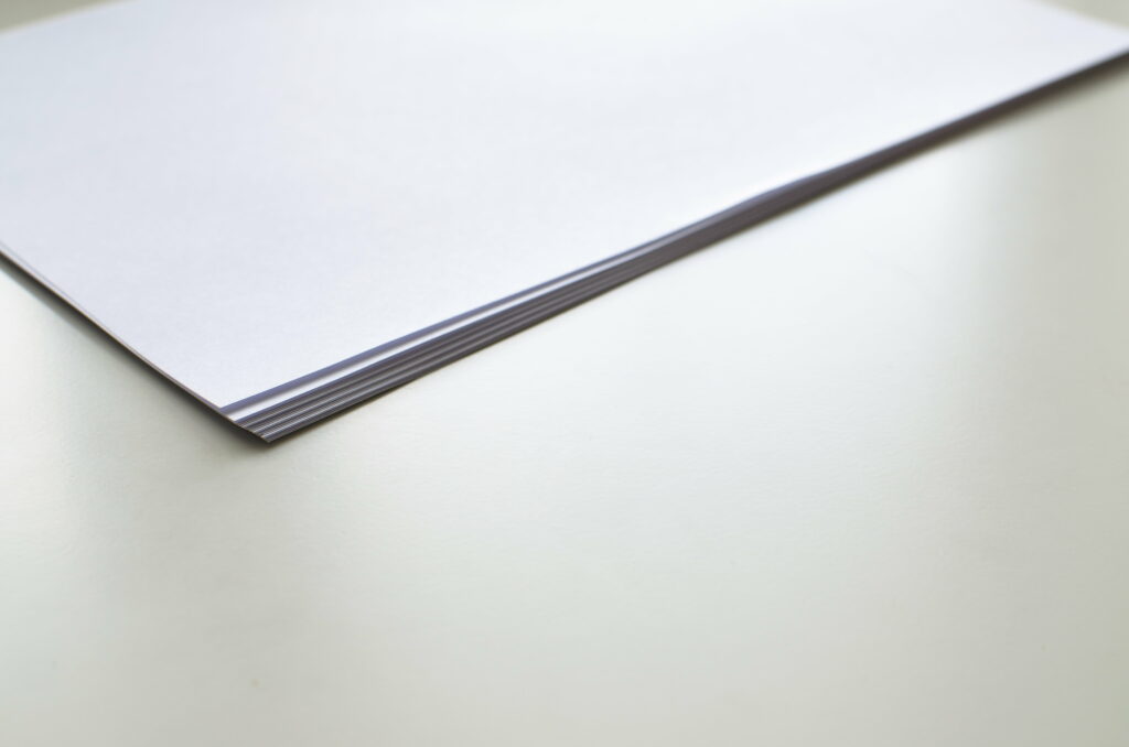 White Papers: Illuminating the Table with Knowledge as Majestic 5K Wallpaper Enchants the Background