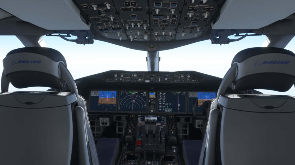 Cockpit View in Microsoft Flight Simulator: Captivating Flight Instruments amid Pilot and Co-Pilot Seats Wallpaper