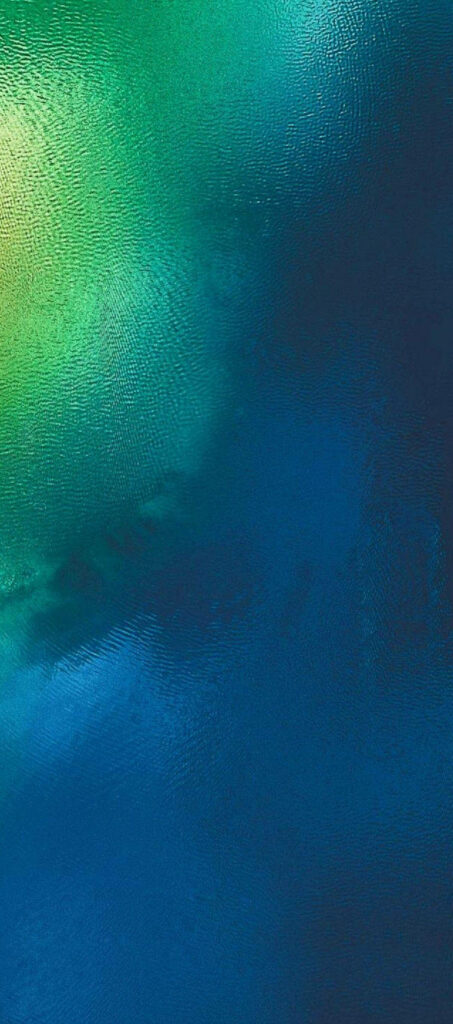 Serene iOS 12 Landscape: A Breathtaking Blend of Blue and Green in Wallpaper