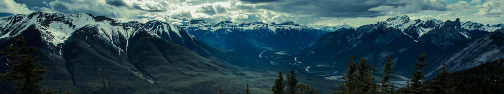 Immersive Triple Monitor Setup: Spectacular Mountain View for Gaming, Home, or Office Workspace Wallpaper