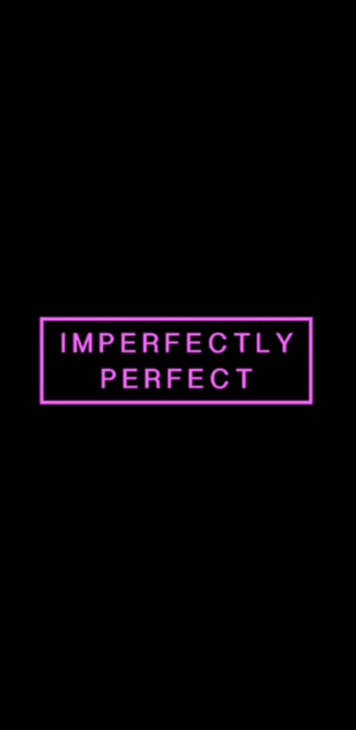 Imperfectly Perfect Quote in Pink Neon on Dark Background Wallpaper
