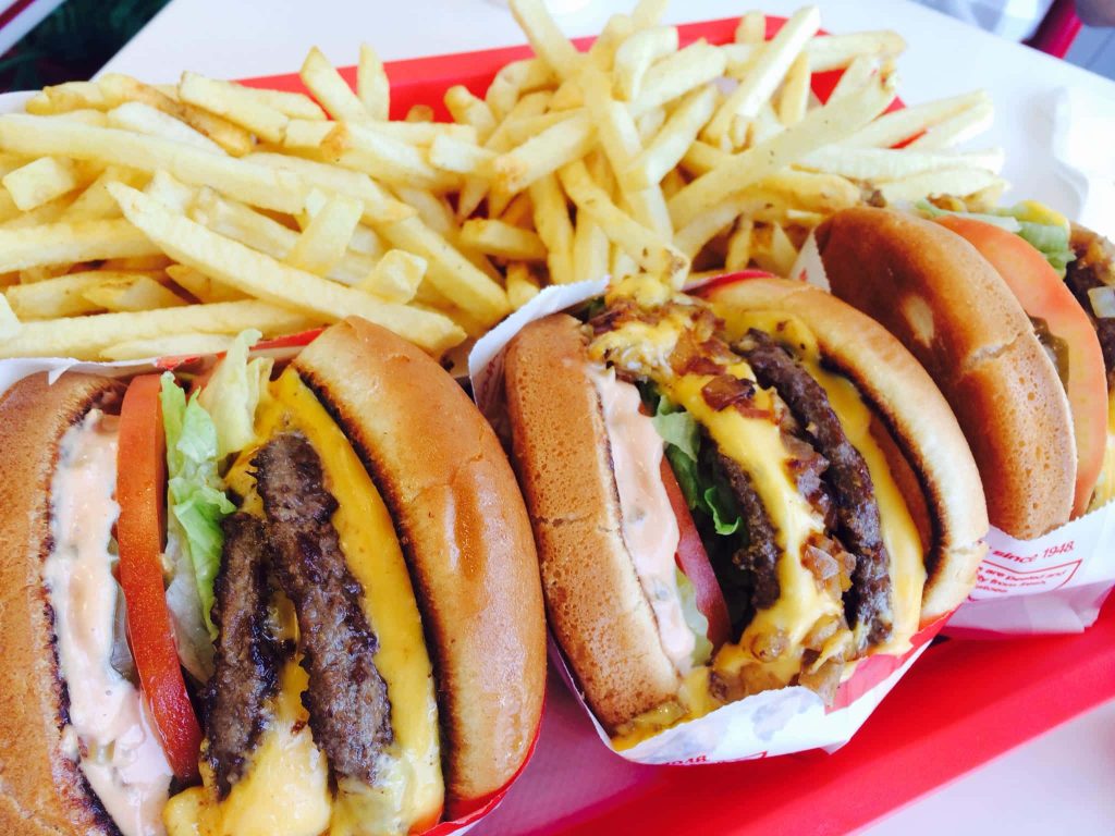 In-N-Out Double-Double burger and crispy fries on red tray high-quality food wallpaper