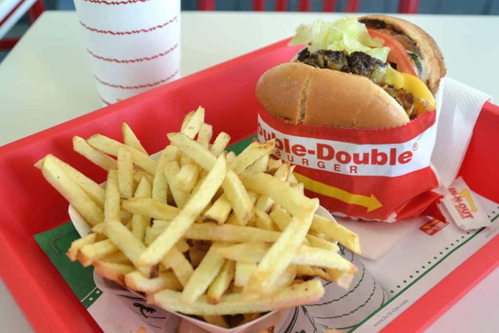In-N-Out Double-Double cheeseburger with fries on red tray high-resolution fast food wallpaper background