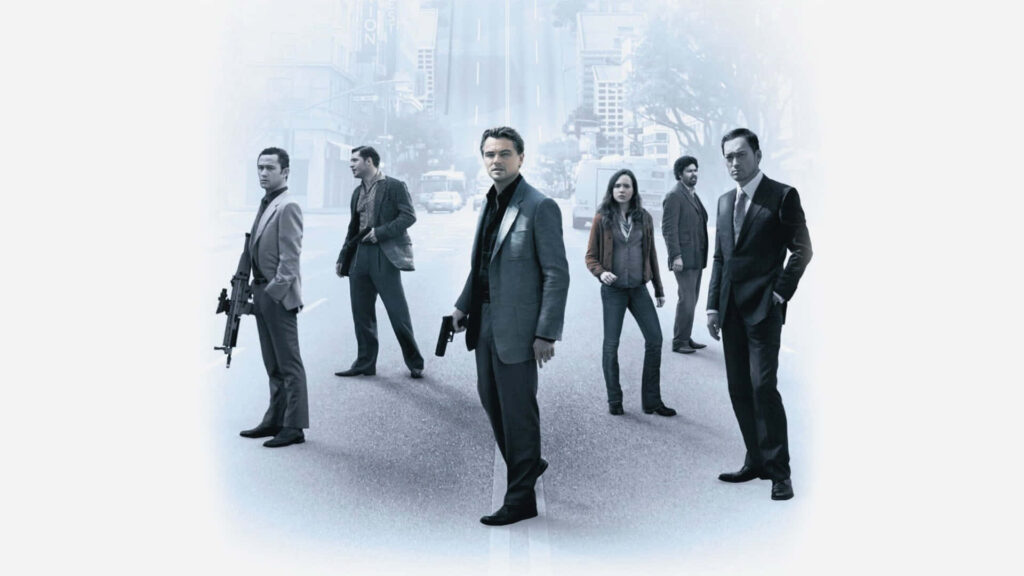 Inception movie main team standing with faded city background intense mysterious wallpaper