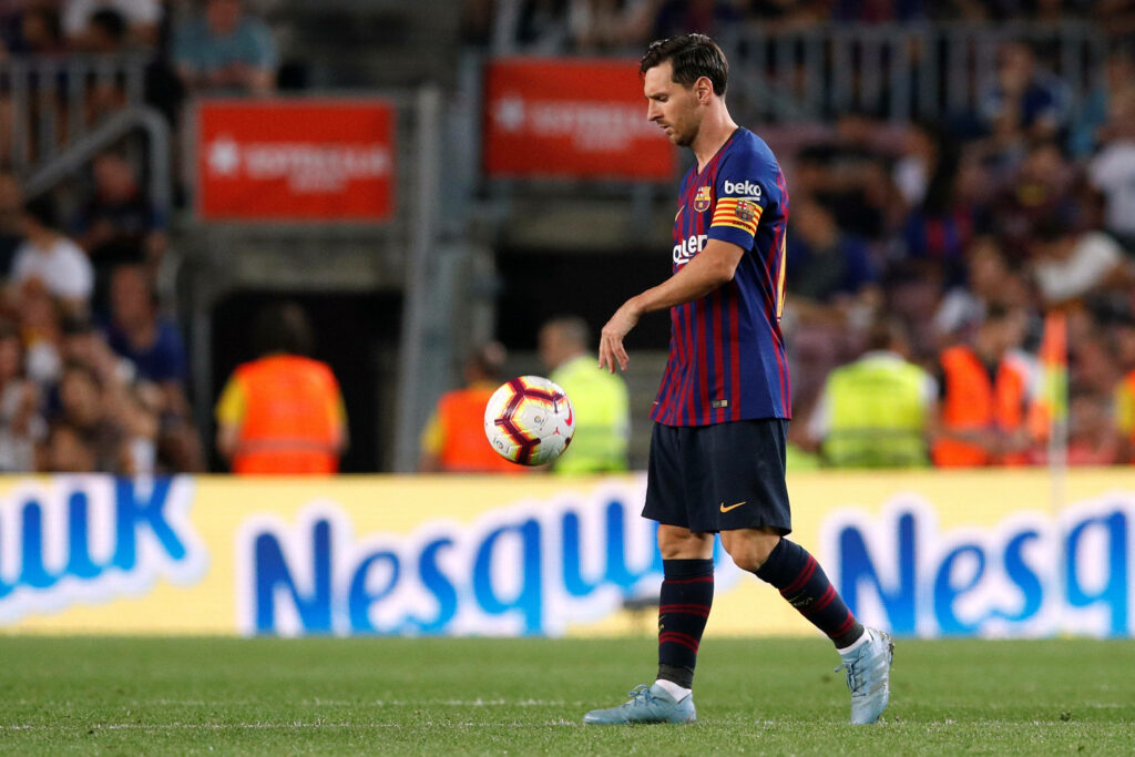 Majestic Messi 2020: Unleashing His Arsenal on the Field Wallpaper