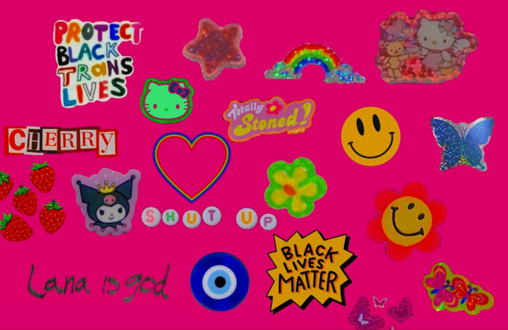 Indie Dream: Stylish Laptop Background Awash in a Pink Sticker Collage Wallpaper