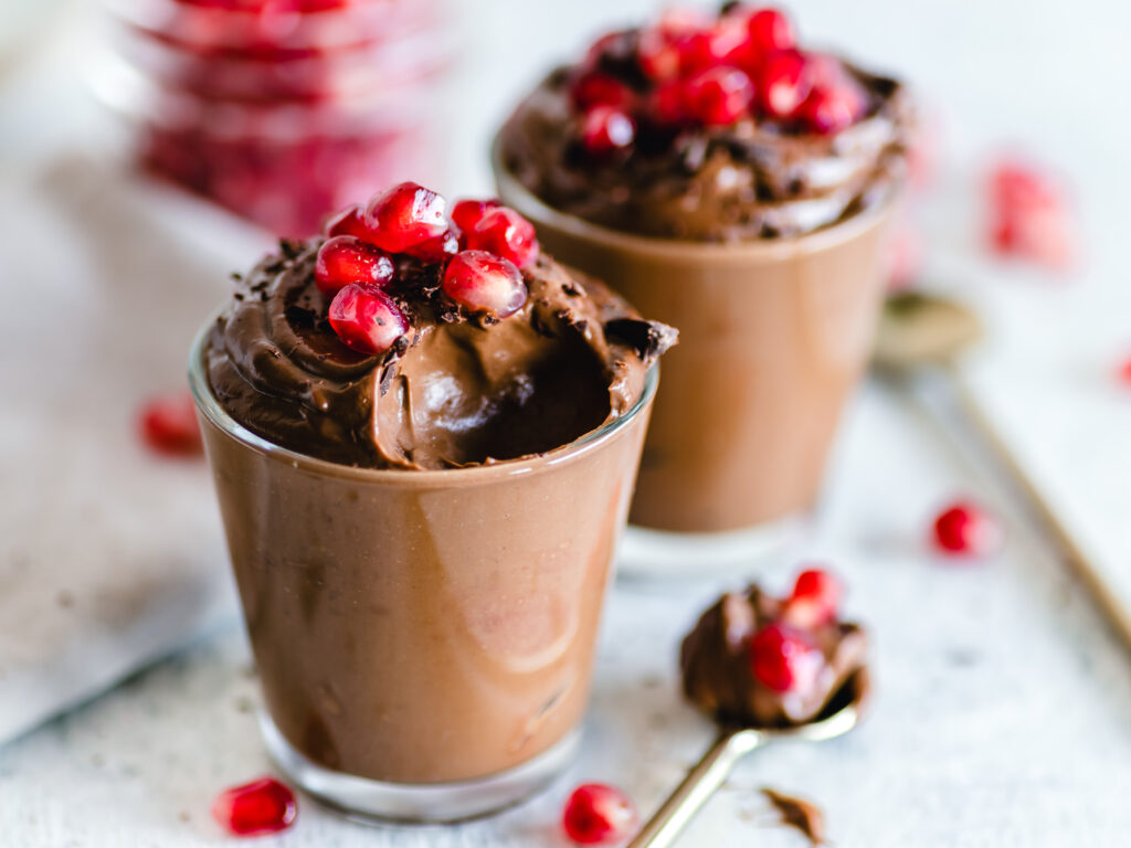 Decadent Chocolate Pudding Wallpaper with Pomegranate Garnish